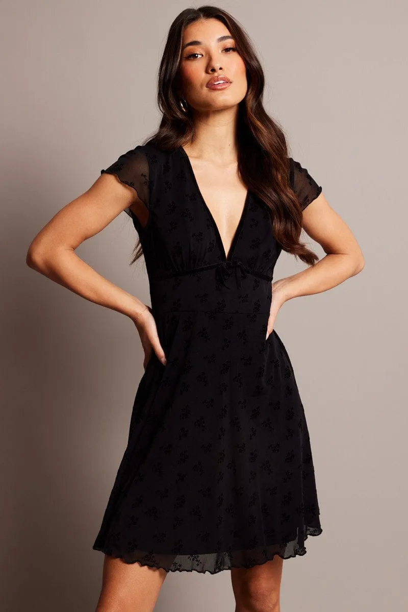 Black Ditsy Mini Dress Short Sleeve Burn out sold by Ally Fashion