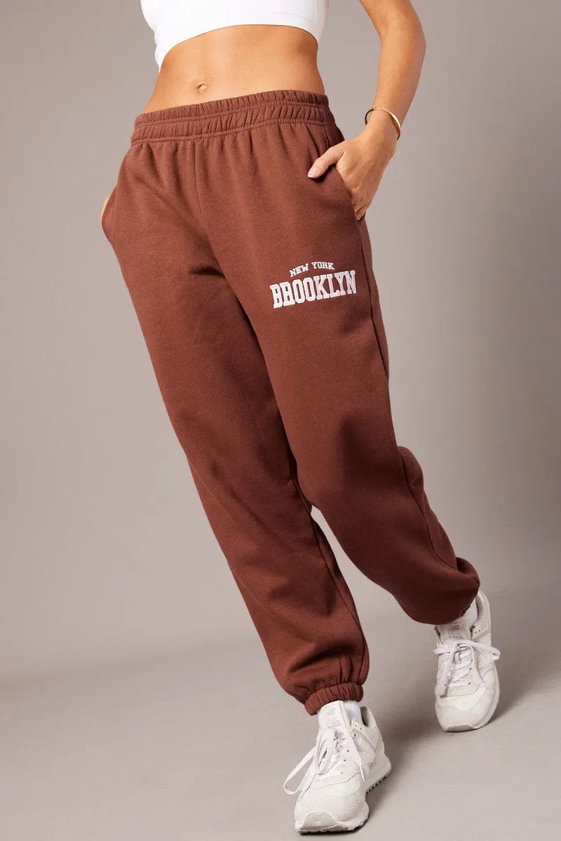 Brown Track Pants High Rise sold by Ally Fashion