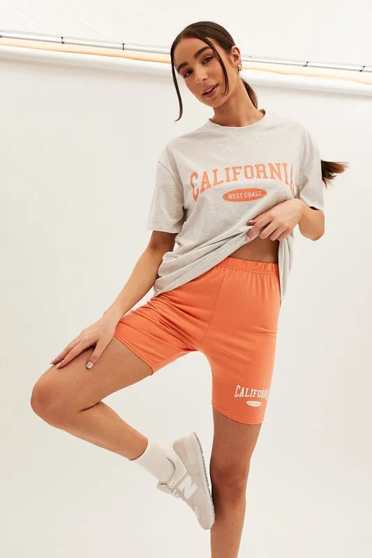 Orange Graphic T And Biker Shorts Set sold by Ally Fashion