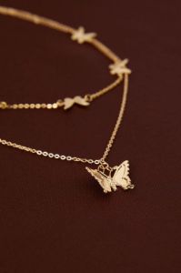 Gold Butterfly Charm Detail Layered Necklace sold by Ally Fashion