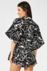 Black Abstract Oversized Playsuit sold by Ally Fashion