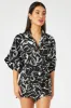 Black Abstract Oversized Playsuit sold by Ally Fashion