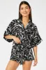 Black Abstract Oversized Playsuit sold by Ally Fashion