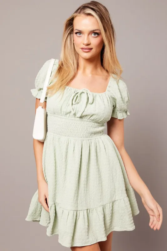 Green Fit And Flare Dress Puff Sleeve Textured fabric sold by Ally Fashion