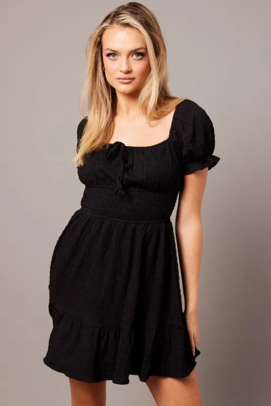 Black Fit And Flare Dress Puff Sleeve Textured fabric sold by Ally Fashion