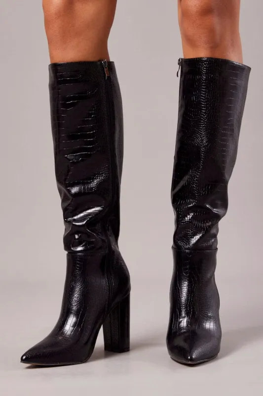Black Heeled Knee High Boots in Croc sold by Ally Fashion