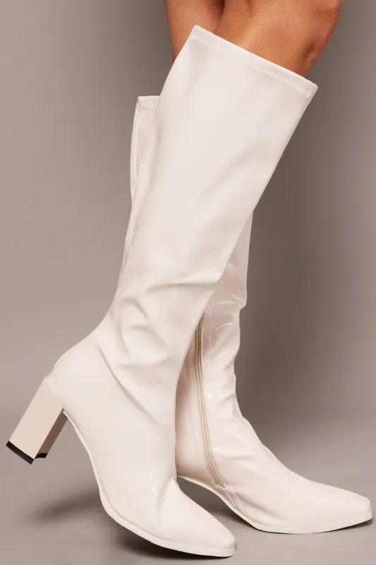 White Knee High Boots in Patent sold by Ally Fashion