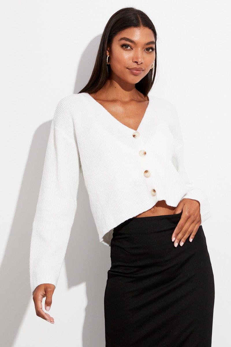 White Fluffy Cardigan sold by Ally Fashion