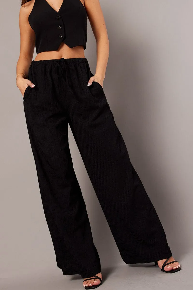 Black Wide Leg Pants High Rise Textured Fabric sold by Ally Fashion