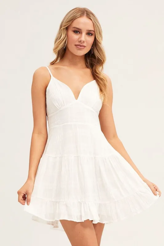 White Sleeveless Tie Back Tiered Skater Dress sold by Ally Fashion