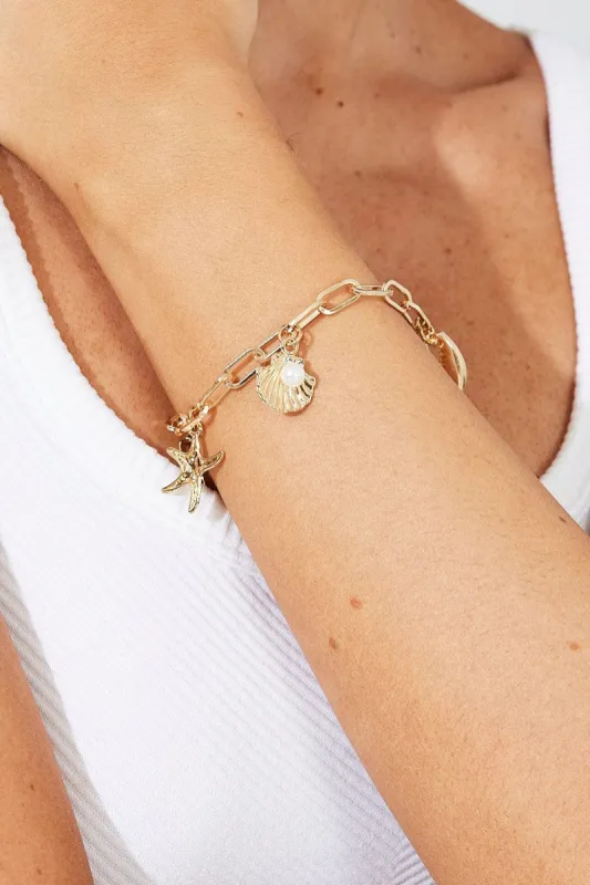 Gold Shell Bracelet sold by Ally Fashion