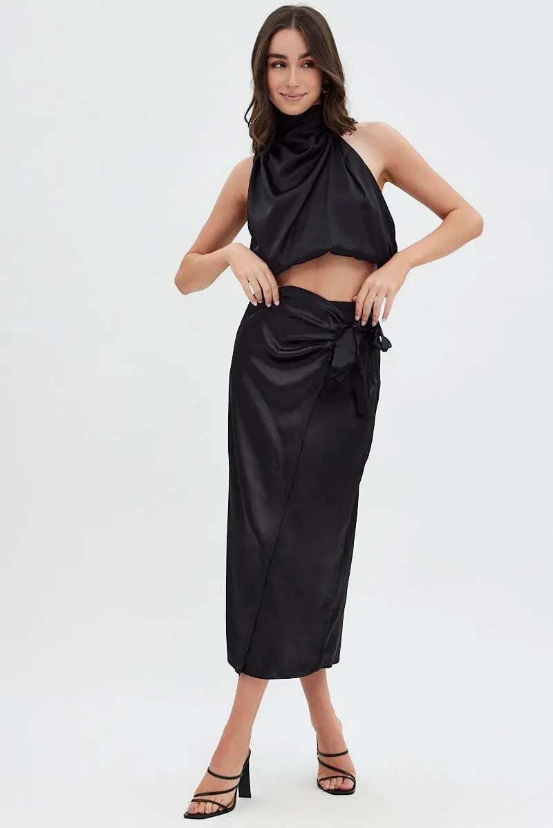 Black Twist Midi Skirt sold by Ally Fashion