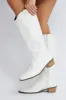 White Western Boots sold by Ally Fashion