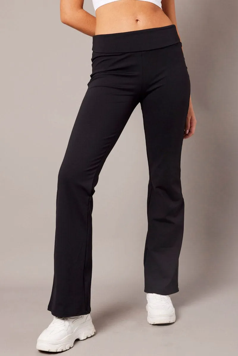 Black Flared Pants Fold Up Waist Mid Rise sold by Ally Fashion