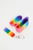 Multi Mardi Gras Rainbow Print Air Pod Case With Charm sold by Ally Fashion