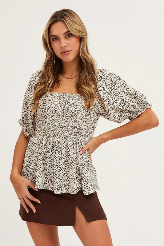 Geo Print Puff Sleeve Shirred Top sold by Ally Fashion