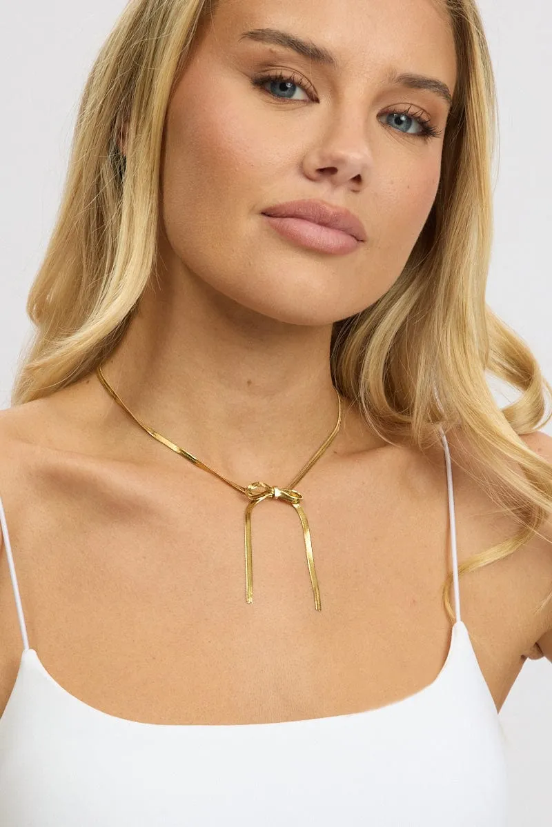 Gold Bow Necklace sold by Ally Fashion