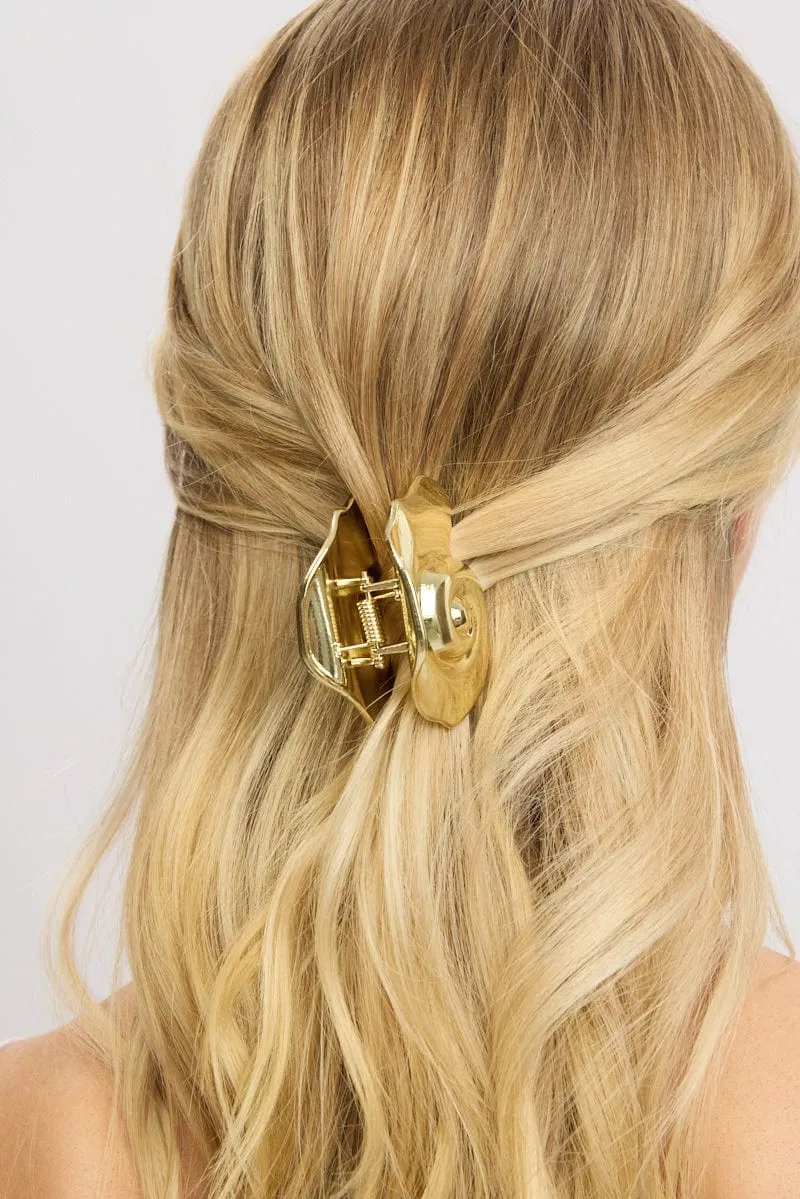 Gold Spiral Claw Clip sold by Ally Fashion