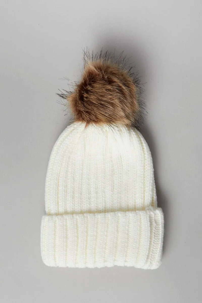 White Faux Fur Pom Pom Beanie sold by Ally Fashion