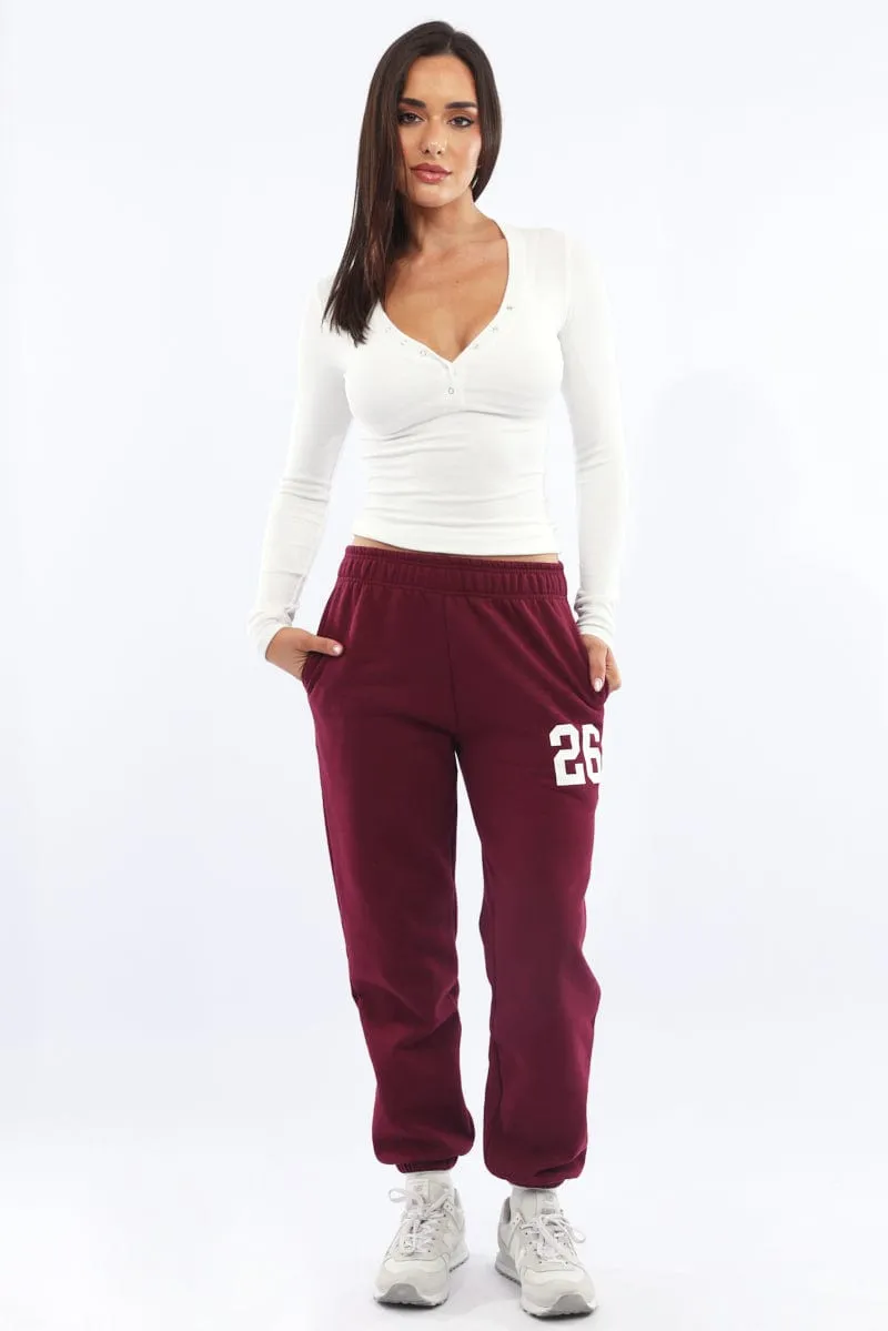 Red Track Pants Jogger sold by Ally Fashion