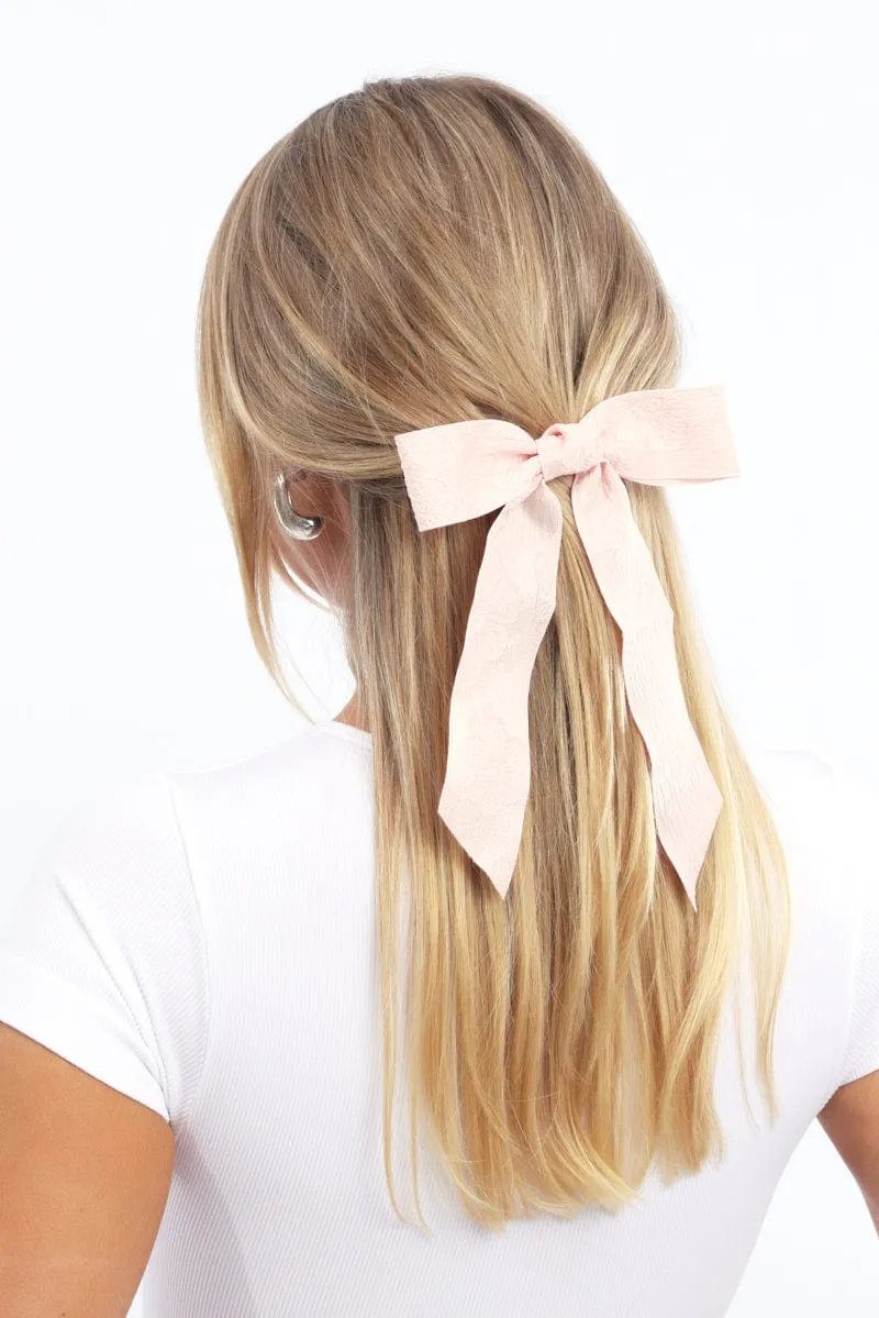 Pink Textured Hair Bow sold by Ally Fashion