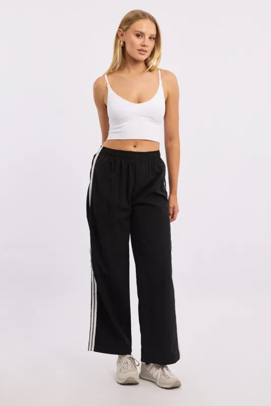 Black Track Pants Side Stripe sold by Ally Fashion