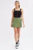 Green Mini Skirt High Rise Pocket Detail Faux Leather sold by Ally Fashion