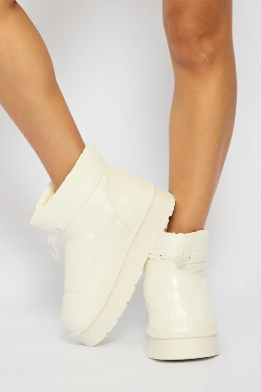 White Snow Boots sold by Ally Fashion