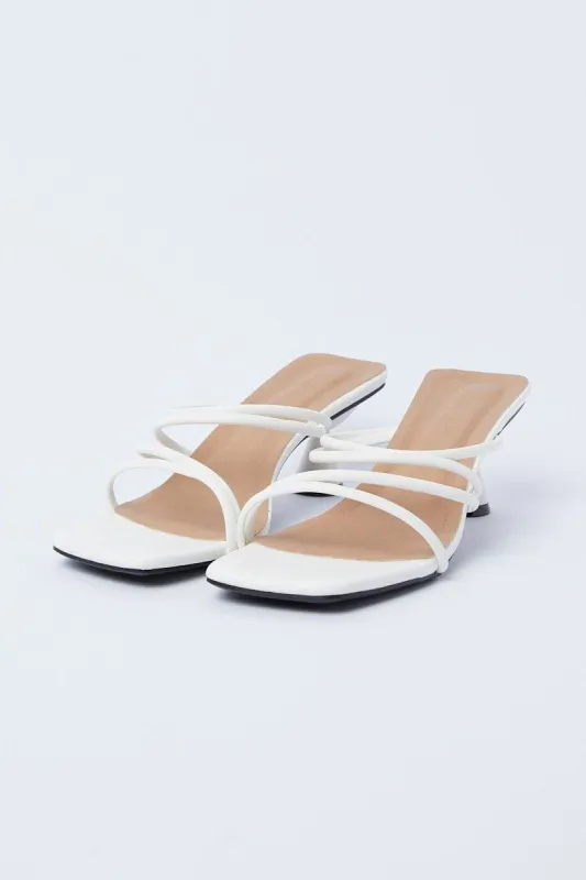 White Mules sold by Ally Fashion