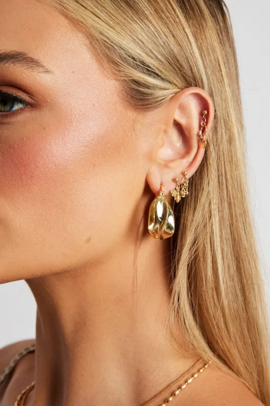 Gold Twist Hoop Earrings sold by Ally Fashion