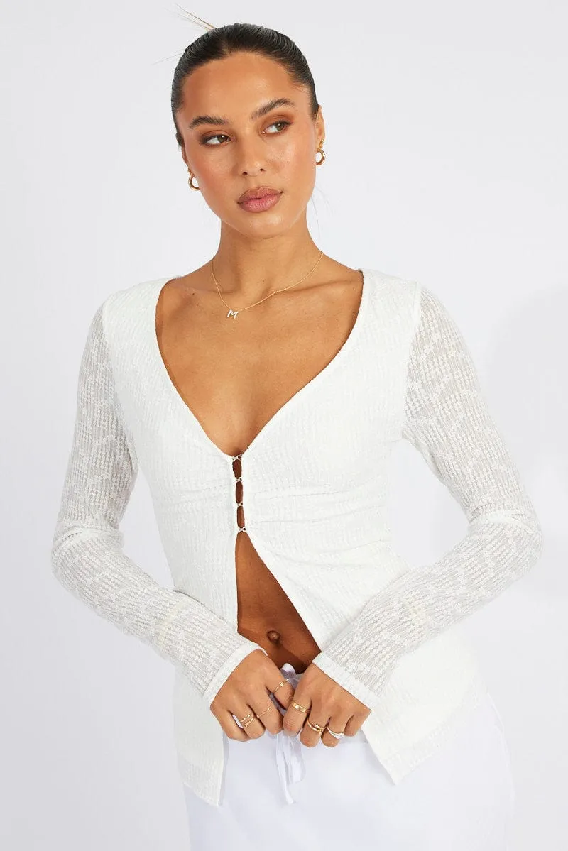 White Textured Top Long Sleeve sold by Ally Fashion