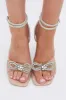 Beige Rhinestone And Bow Stiletto Heeled Sandals sold by Ally Fashion