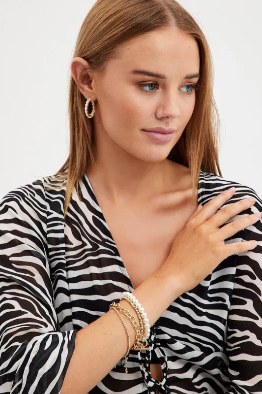 Gold 4 Pack Faux Pearl And Chain Bracelet Set sold by Ally Fashion
