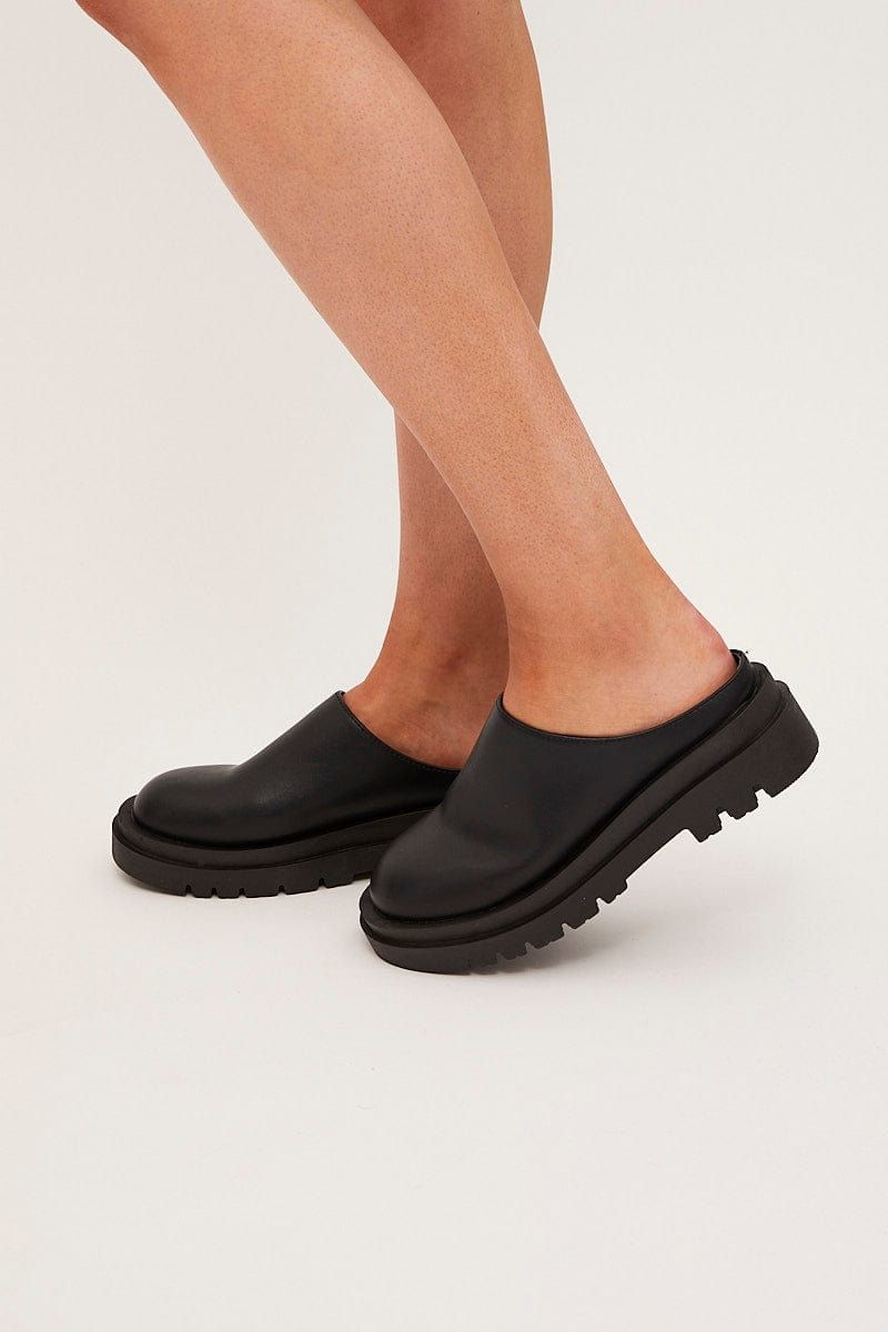 Black Chunky Sole Flat Mules sold by Ally Fashion