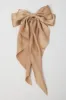 Beige Large Bow Hair Clip sold by Ally Fashion