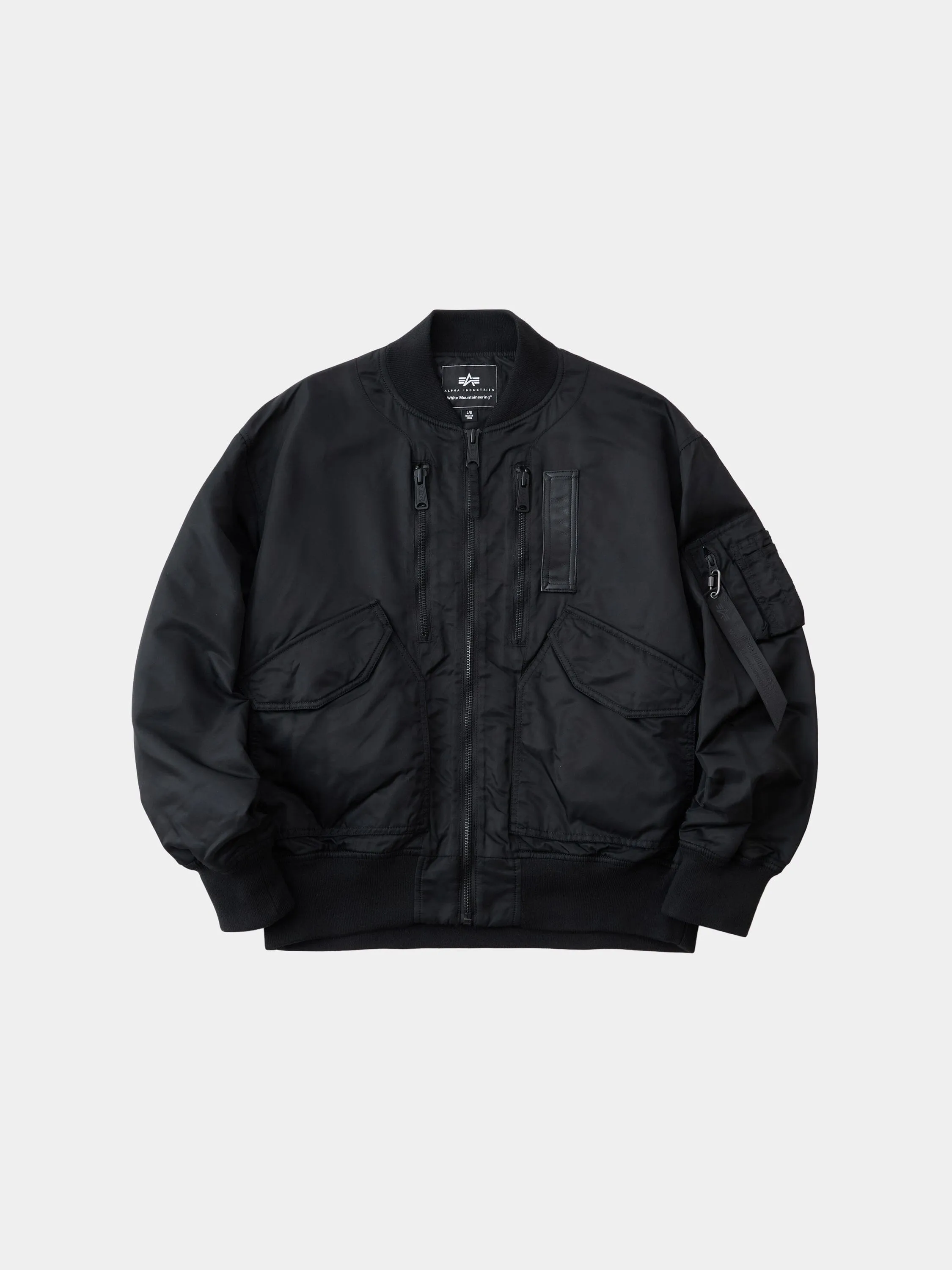 WHITE MOUNTAINEERING X ALPHA FLIGHT JACKET sold by Alpha Industries