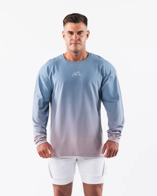 Wolf Head LS Tee - Still Water Gradient sold by Alphalete