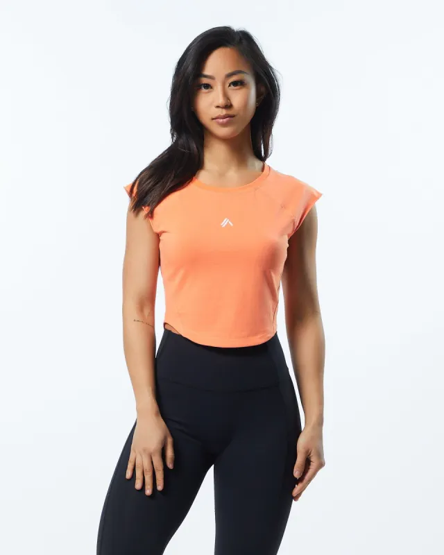 Velocity Crop Tee - Electric Peach sold by Alphalete