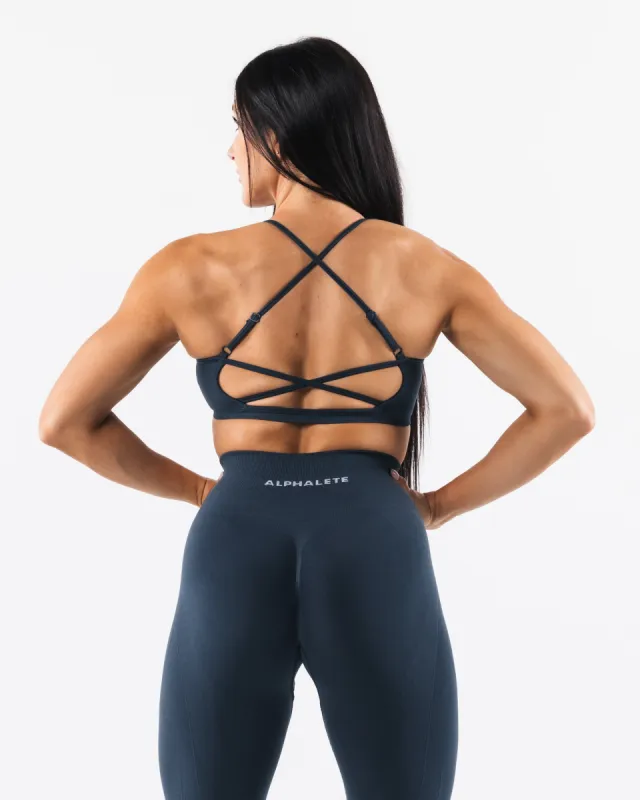 Amplify Back Cross Bra - Trusted Blue sold by Alphalete