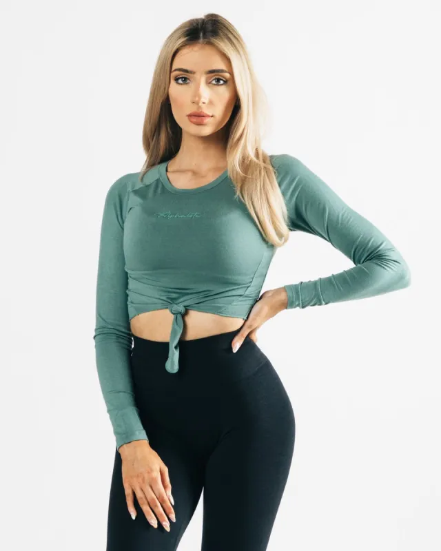 Aspire Signature Long Sleeve Tie Top - Sage sold by Alphalete