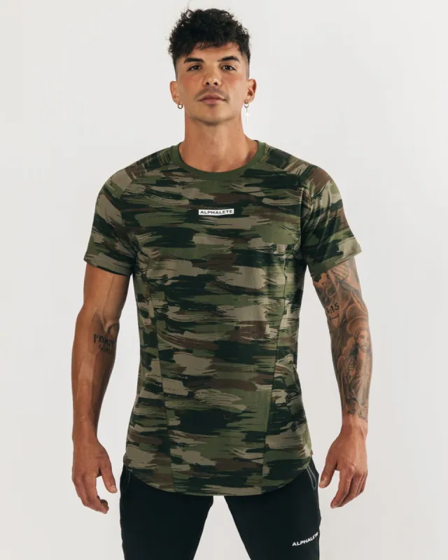 Velocity Tee - Olive Canvas Camo sold by Alphalete