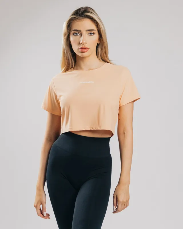 Signature Mesh Crop - Orange Frost sold by Alphalete