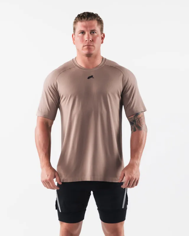 Wolf Head Airtech Tee - Creamy Beige sold by Alphalete