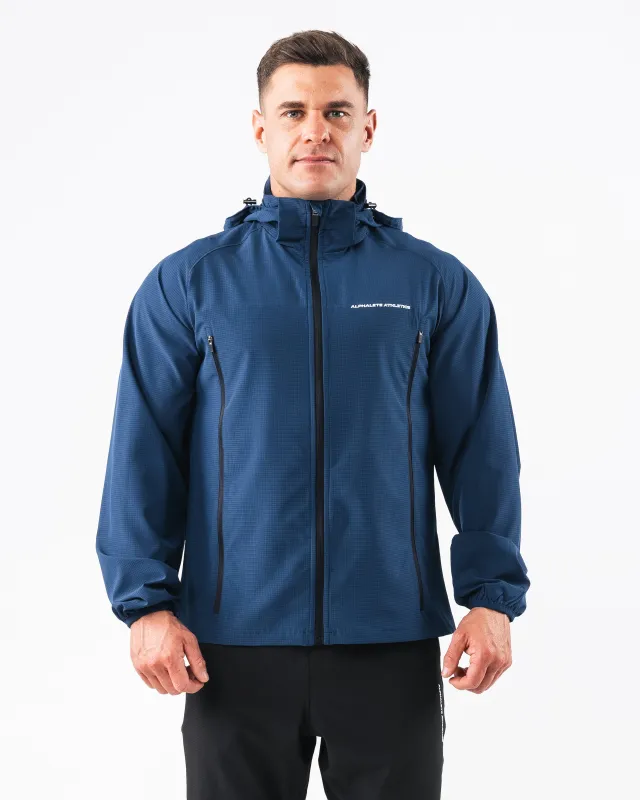 Infinity Tech Jacket - Denim sold by Alphalete