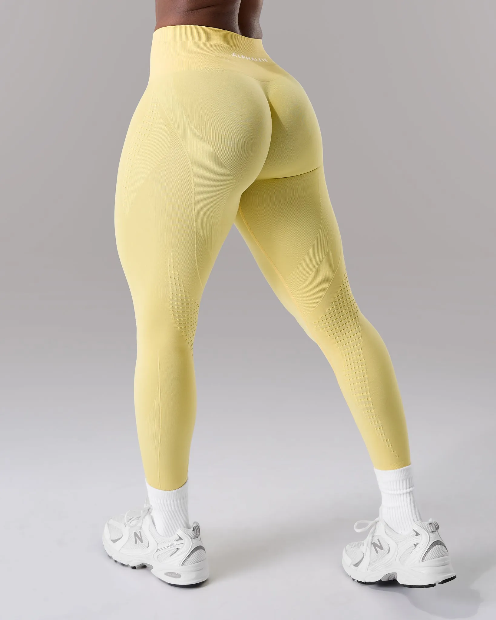 Contour Mid Rise Legging - Canary sold by Alphalete