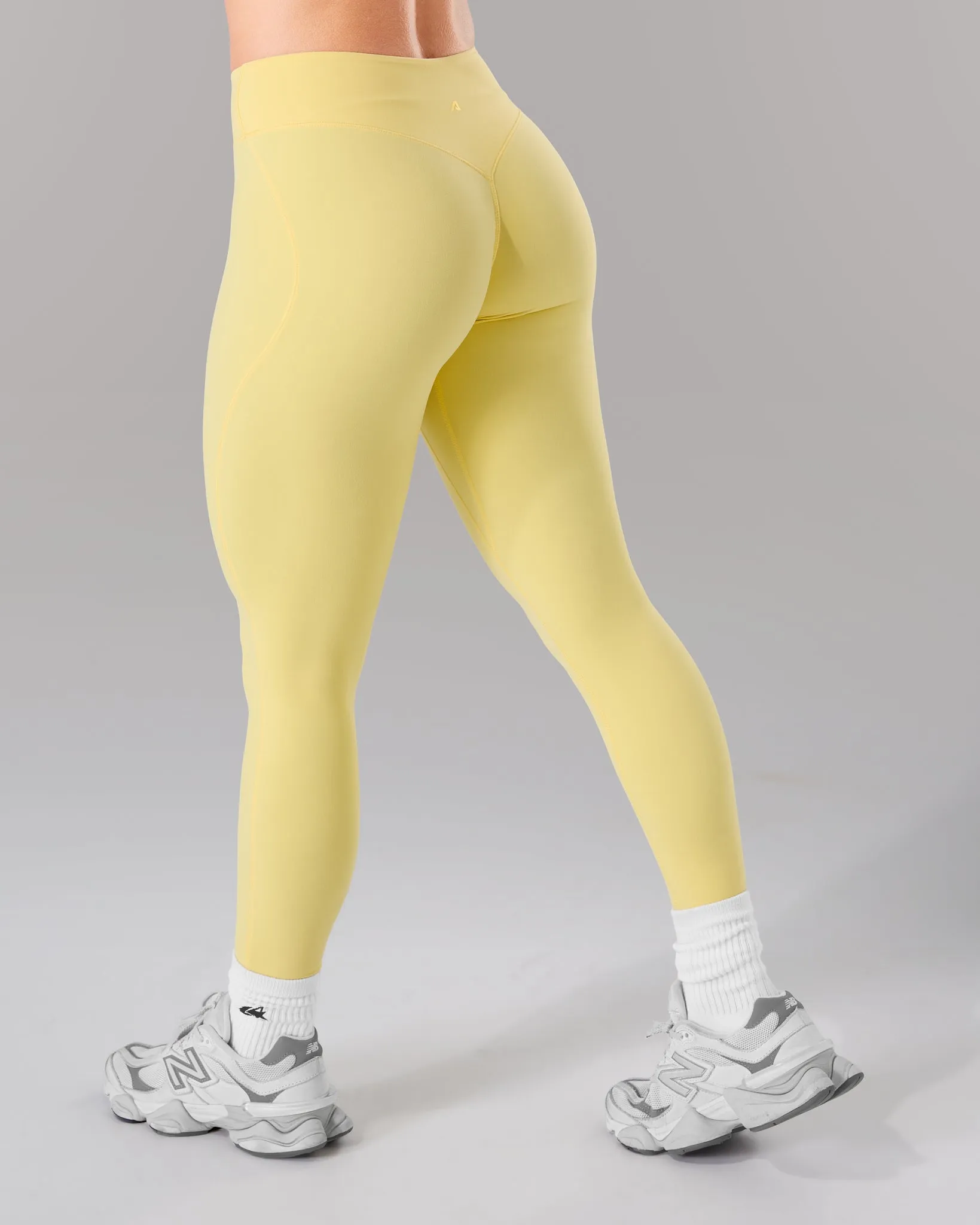 Wrap Mid Rise Legging - Canary sold by Alphalete product image thumbnail 2