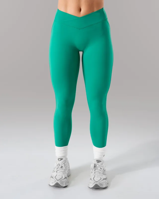 Wrap Mid Rise Legging - Grove sold by Alphalete