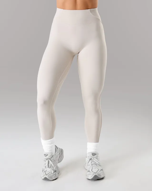 Aura Ultra-High Rise Legging - Wheat sold by Alphalete