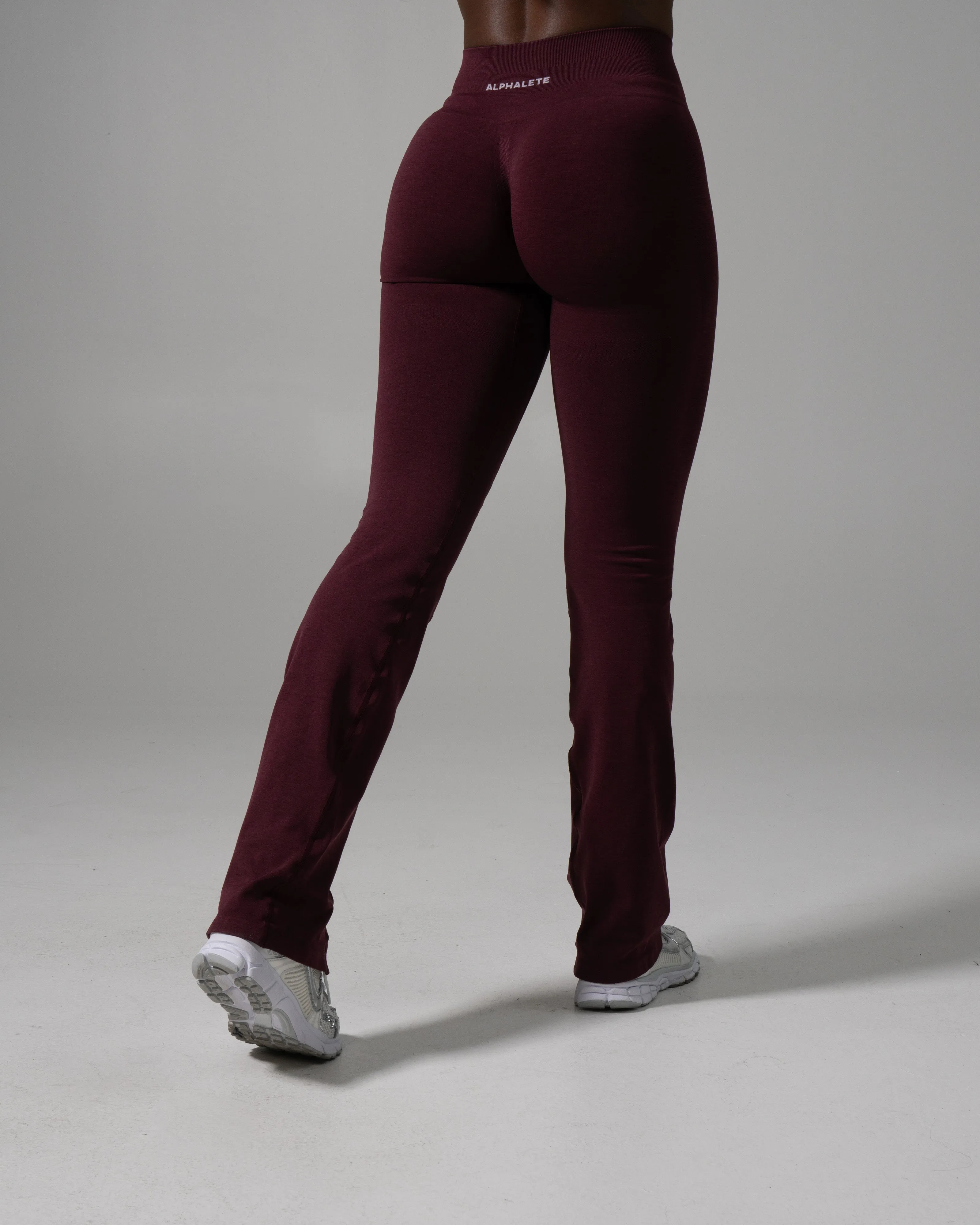 Pump Mid Rise Flared Pant Long - Merlot sold by Alphalete