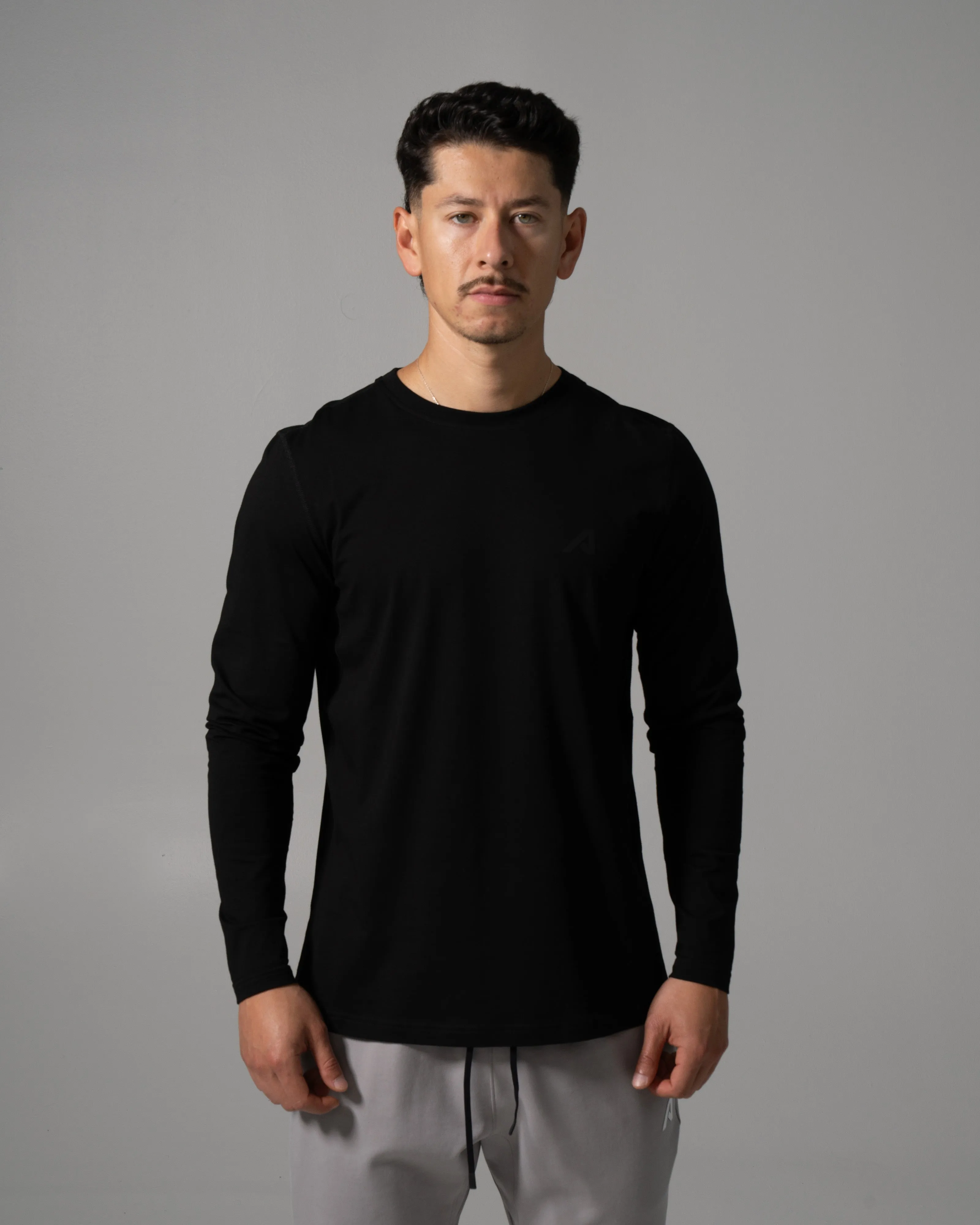 Momentum LS - Black sold by Alphalete